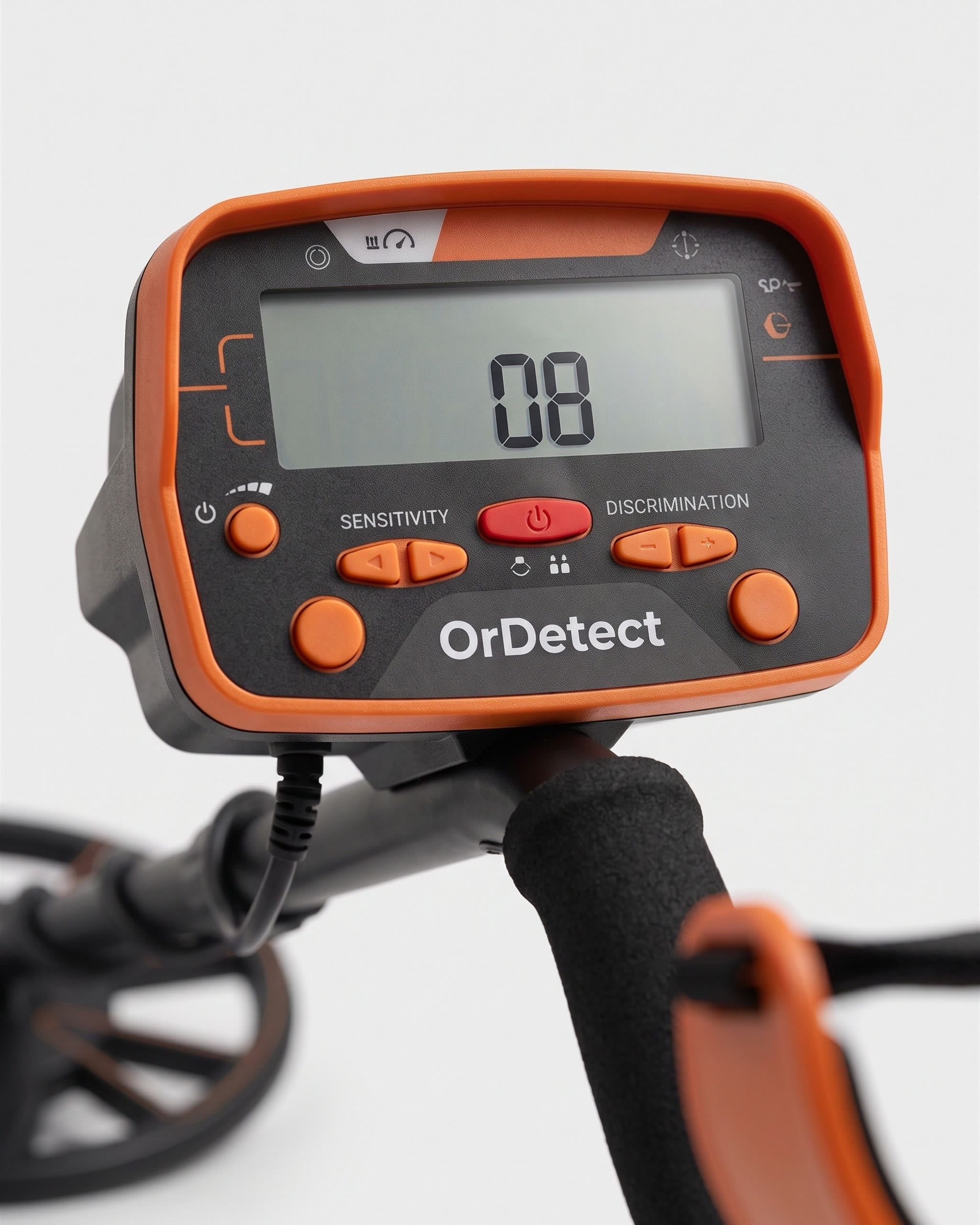 Gros plan du boîtier de commande d'un détecteur de métaux Ordetect, écran LCD et boutons